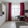 Апарт-отель Barasport city apartments. Апартаменты двухместный DeLuxe Bronze StyleDeLuxe Silver Style с красным диваном 6